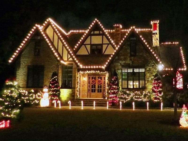 Christmas Lighting on a house and in the front yard done by Gulf Freeway Landscaping and Outdoor Living