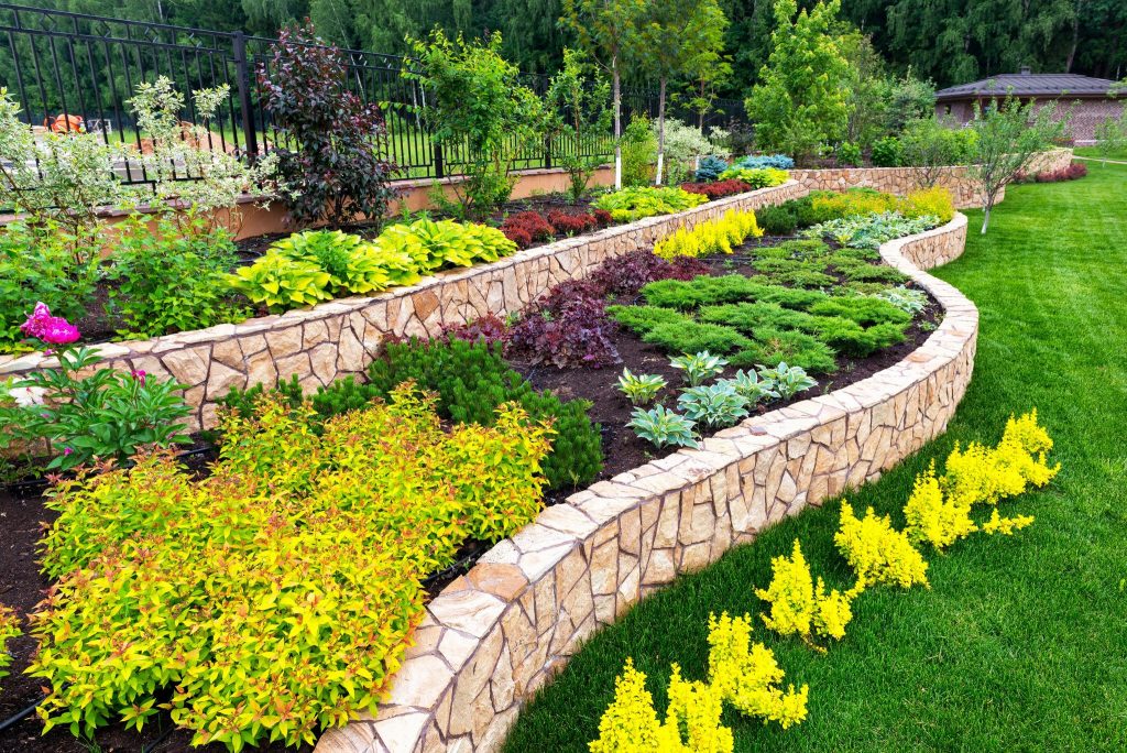 Tiered flowerbed design in a back yard